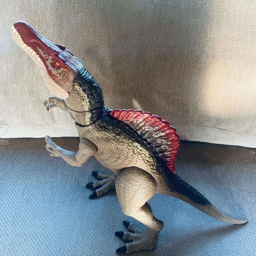 Red and Brown Spinosaurus Action Figure with Dynamic Pose